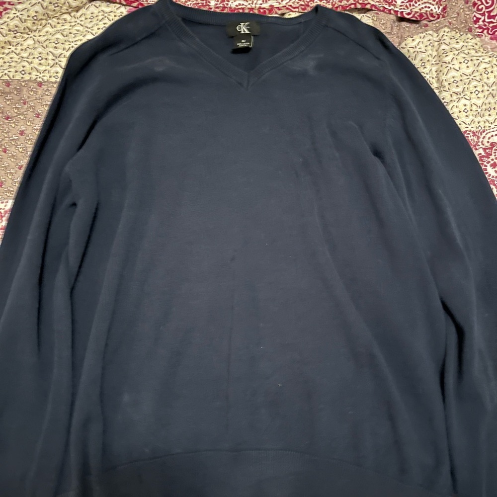 Blue Calvin Klein v neck wool cardigan.
